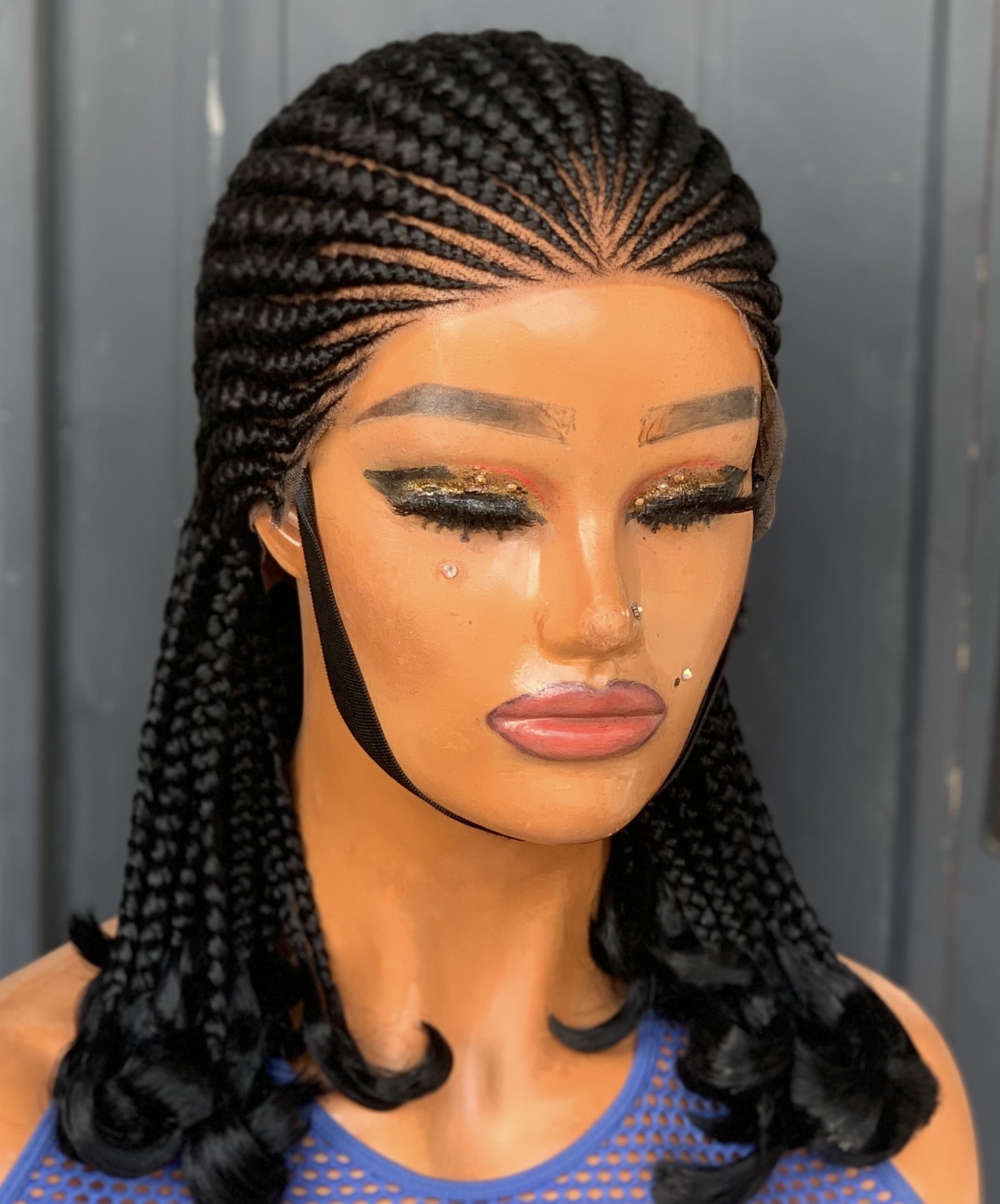 Cornrow lemonade braids with curled ends