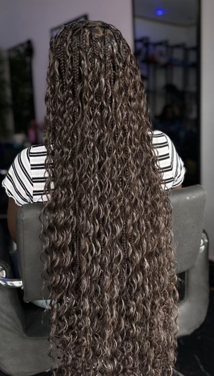 Long boho braids with curly water-wave ends